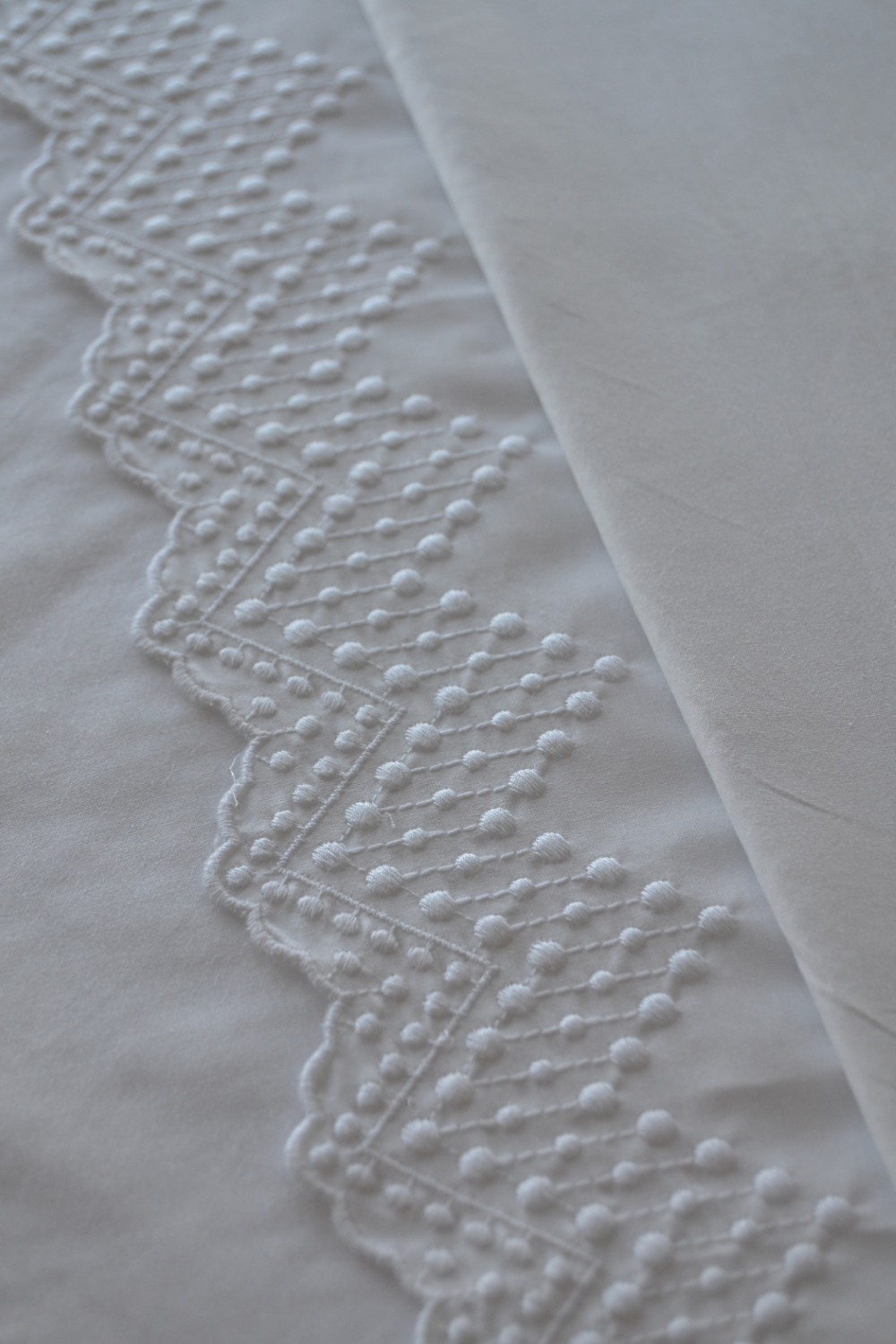 Ensemble de draps à pompons et festons