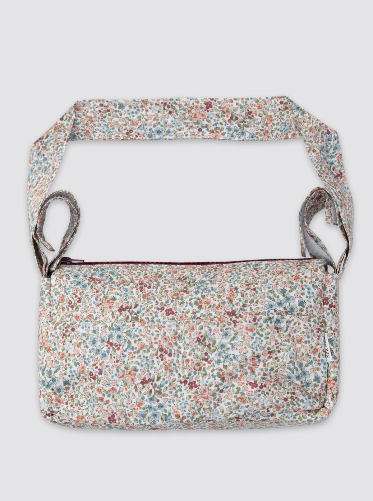 Petit sac à roulettes imperméable blanc bordeaux