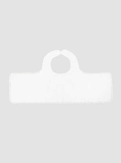 Bande brodée sur le protège-bavoir