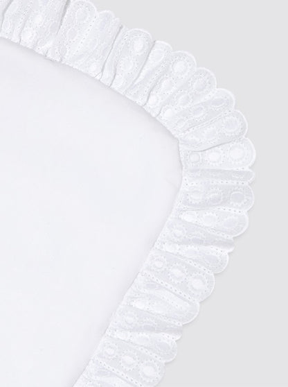 Protège-matelas avec bordure brodée et motif soleil
