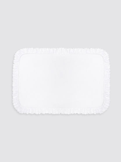 Protège-matelas avec bordure brodée et motif soleil