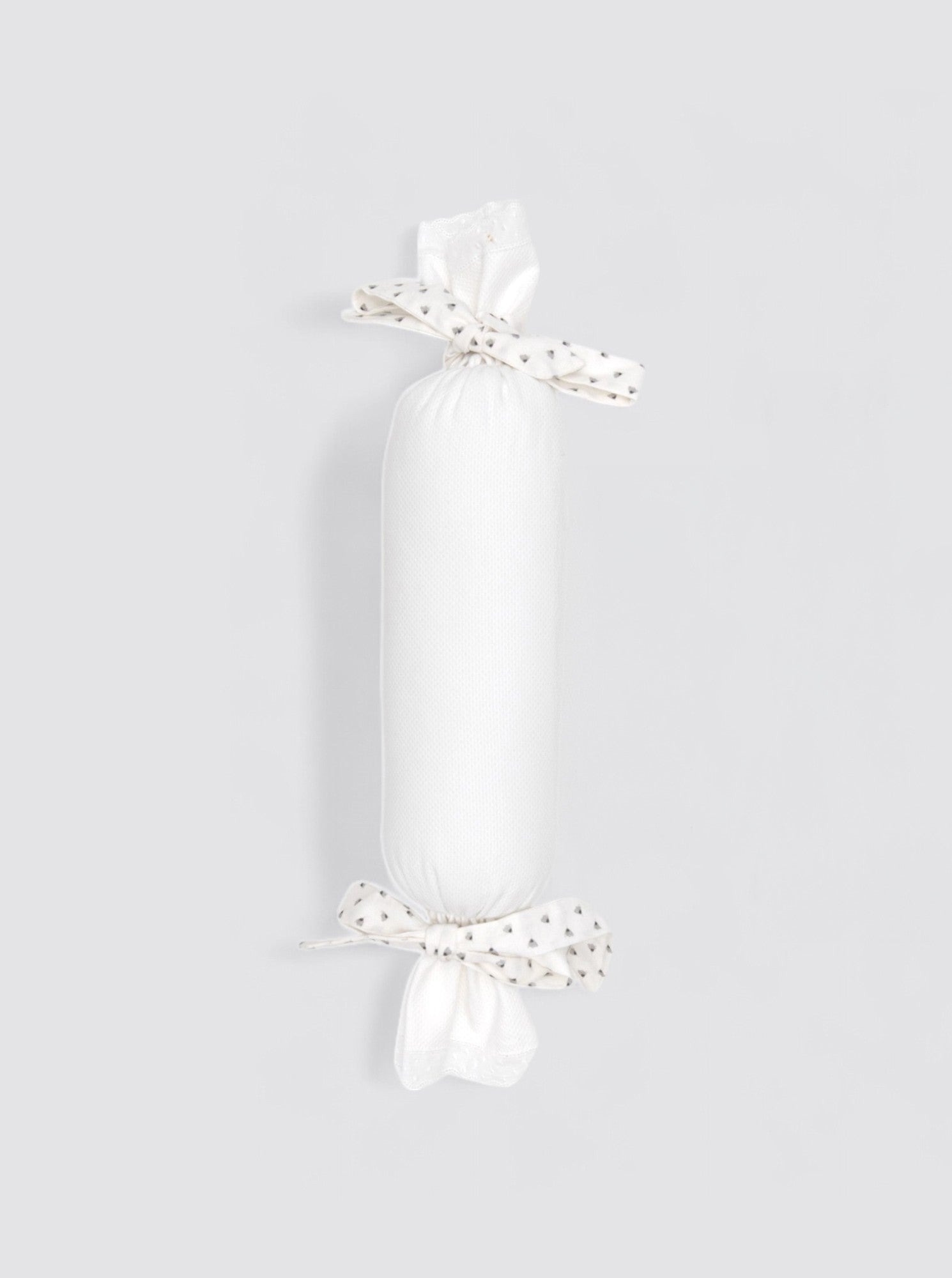 Cojín Antivuelco Piqué Nano- Lazo Estampado