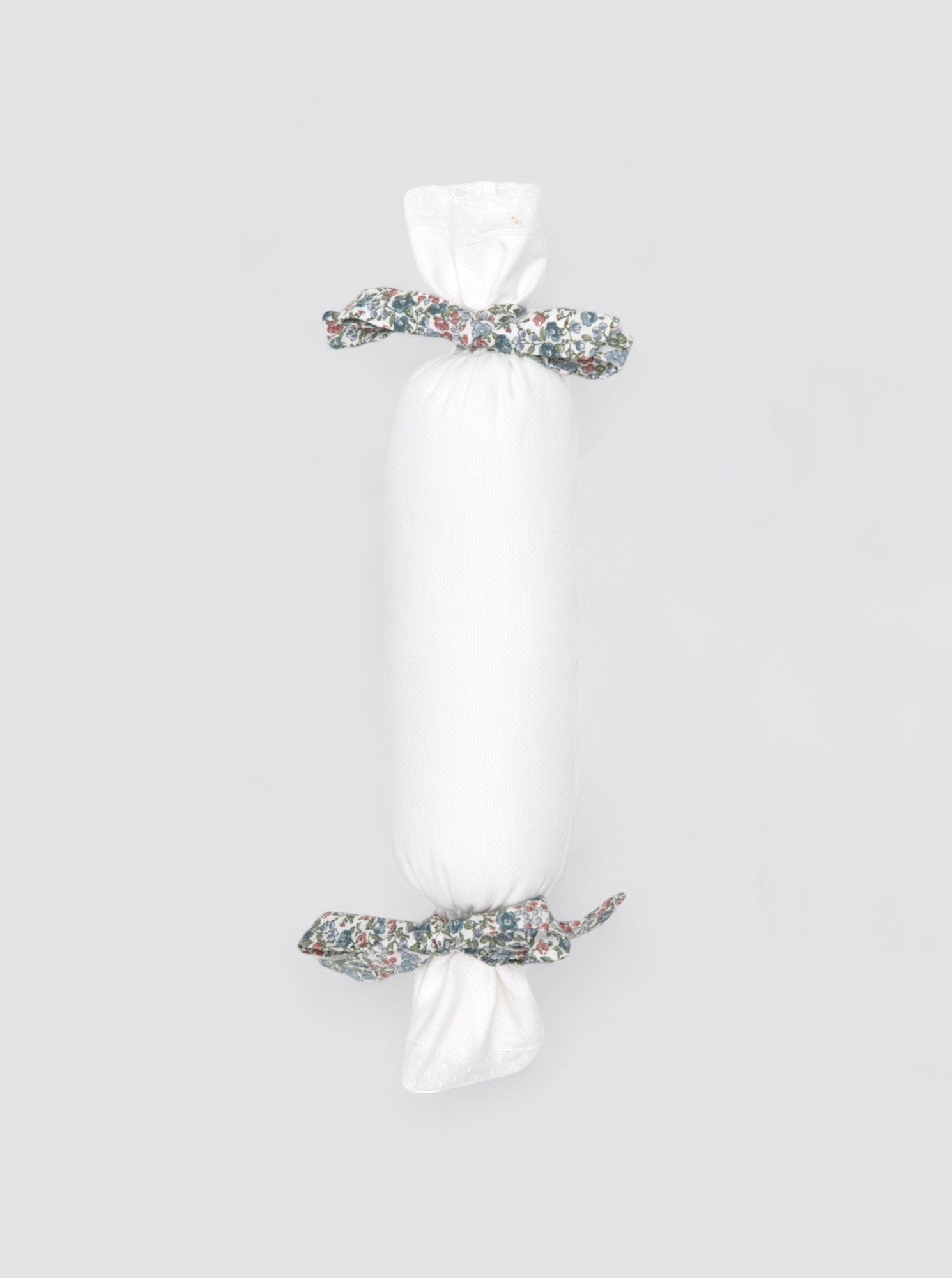 Cojín Antivuelco Piqué Nano- Lazo Estampado