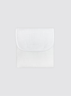 Matelas à langer avec poches et pois blancs