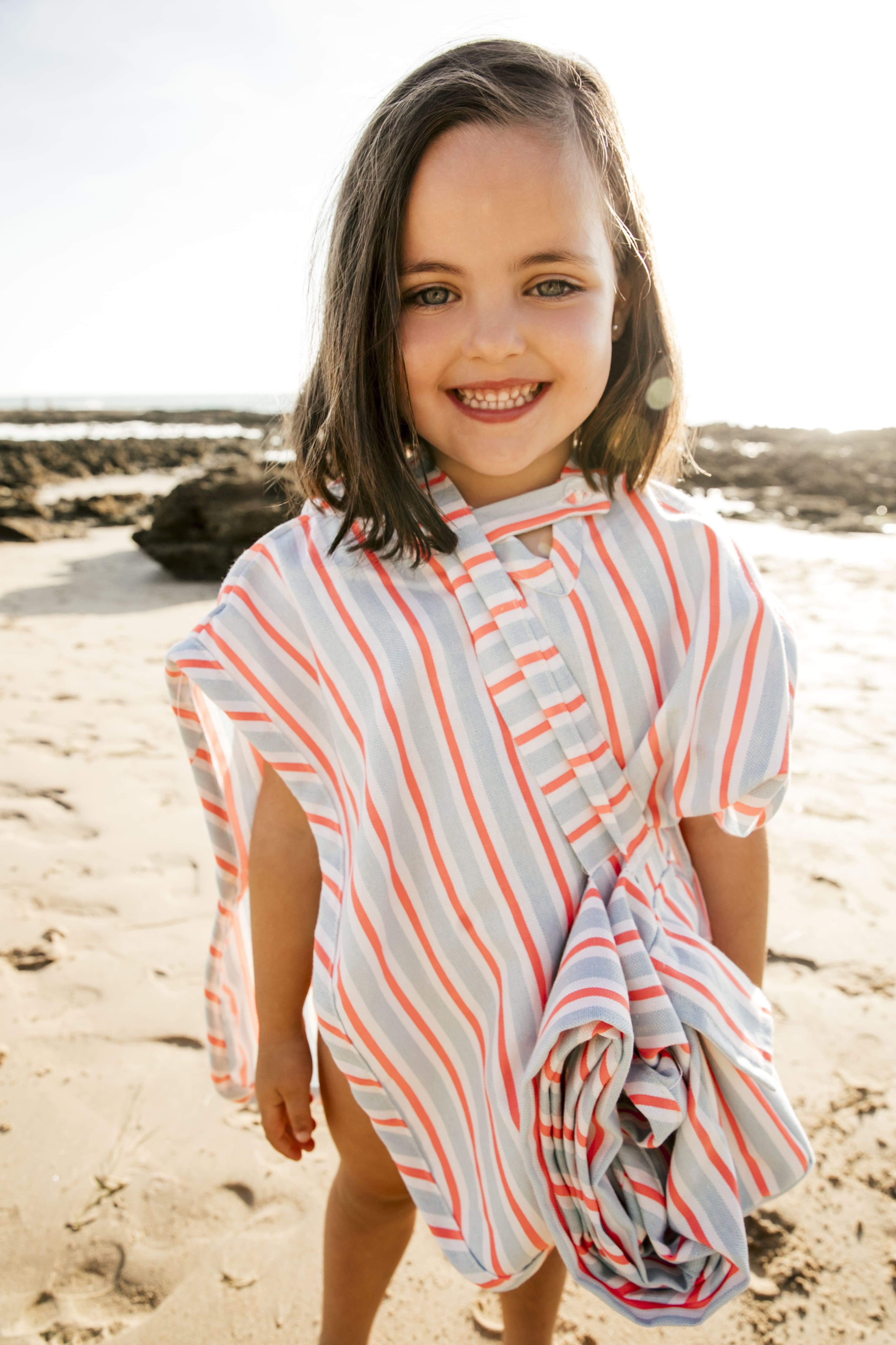 Poncho de plage à rayures roses