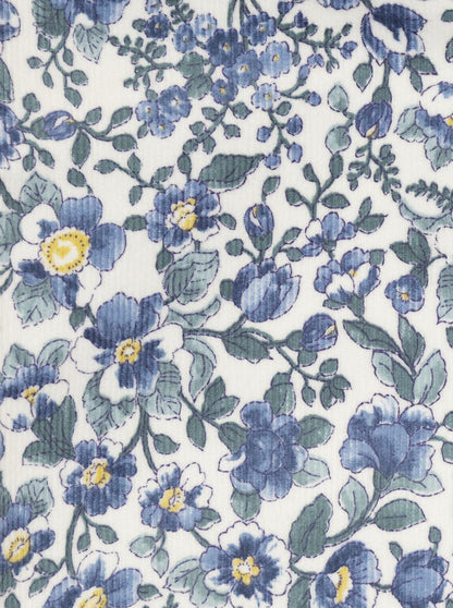 Trousse de toilette en velours côtelé bleu à motif floral